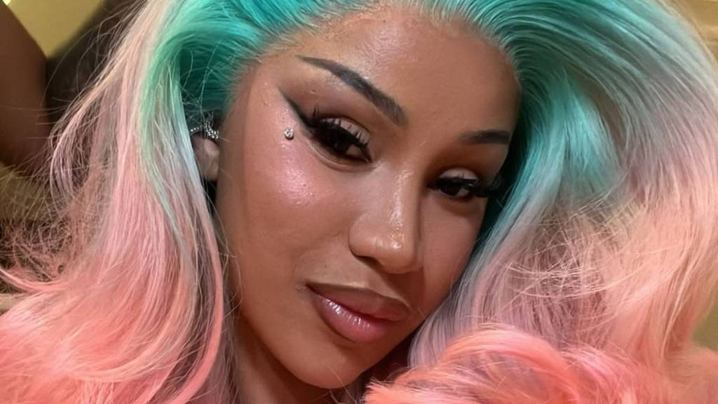 Cardi B Twirling in Cleavage-Baring Dress Has Fans Glued to Their Phones