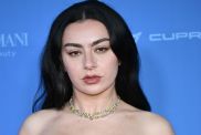 Charli XCX Nearly Spills Out of a Bikini That Barely Stays in Place