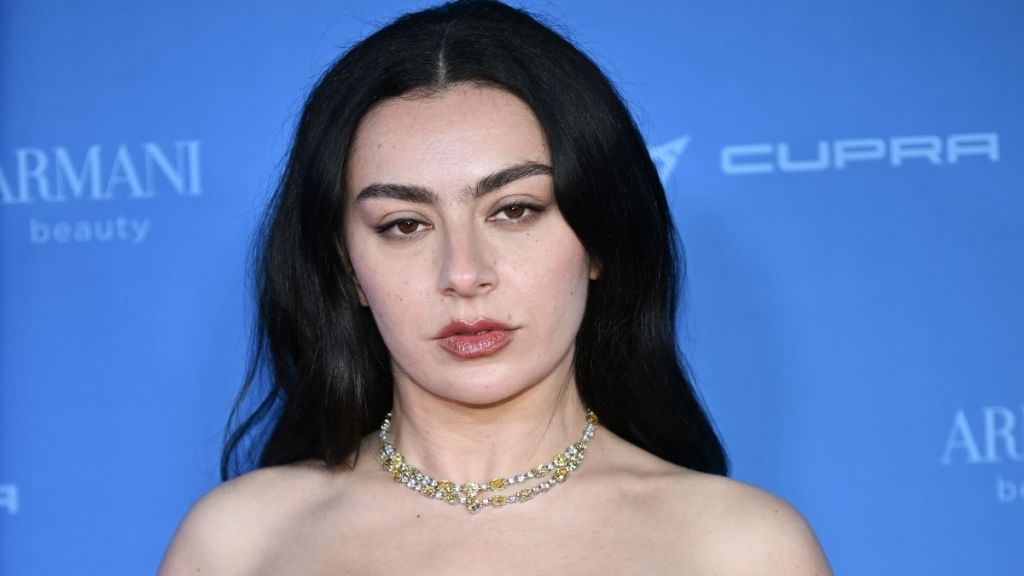 Charli XCX Nearly Spills Out of a Bikini That Barely Stays in Place
