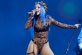 Doja Cat’s Latex Bodysuit Plunges Dangerously Low To Reveal a Surprise