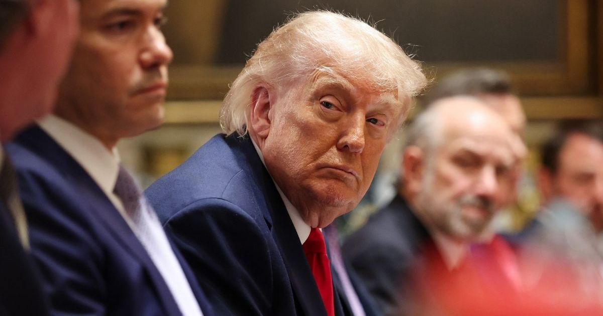 Donald Trump Targets Tucker Carlson & MTG in New AI-Generated Post