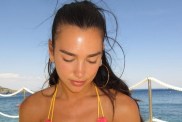 Dua Lipa Rolls Over in a Tiny String Bikini That Leaves Little Covered