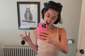 Gracie Abrams’ Backless Dress Bares Her Sides Completely & Dips Real Low