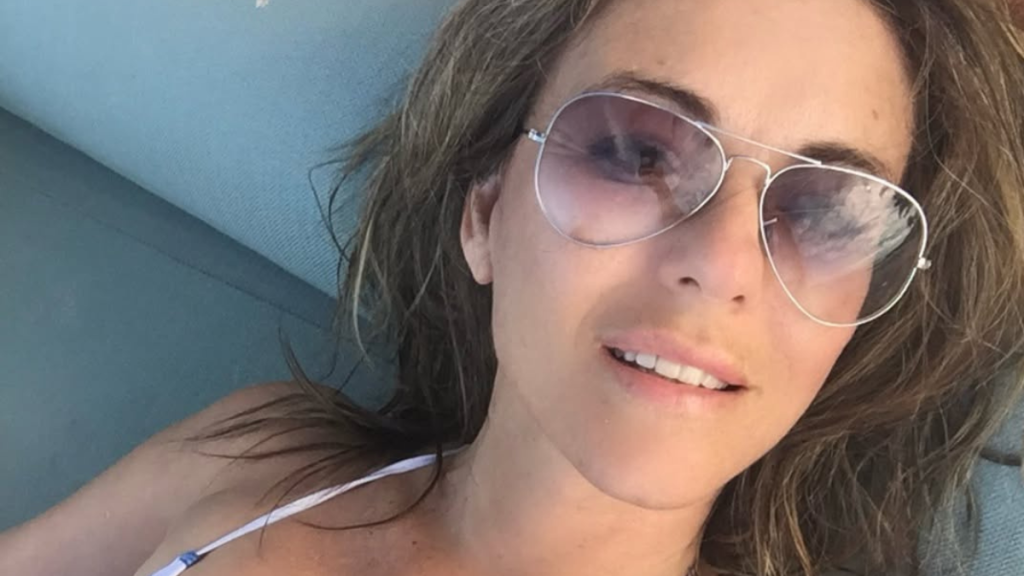 Elizabeth Hurley Goes Pantless in an Oversized Sweatshirt That Leaves Little to the Imagination