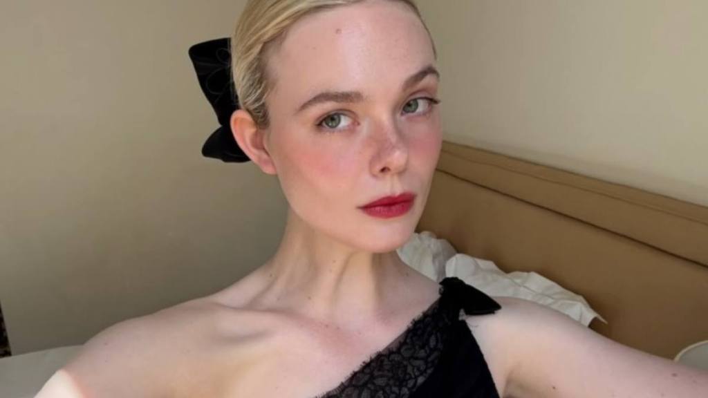 Elle Fanning topless pool photo