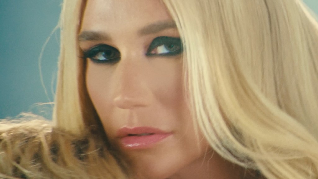 Kesha’s ‘Psycho’ Look in Plunging Sheer Lace Top Has Fans Doing a Double Take