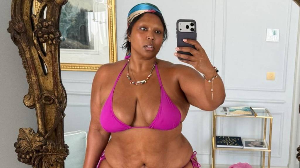 Lizzo Boldly Bares It All in Almost Fully Sheer Gown