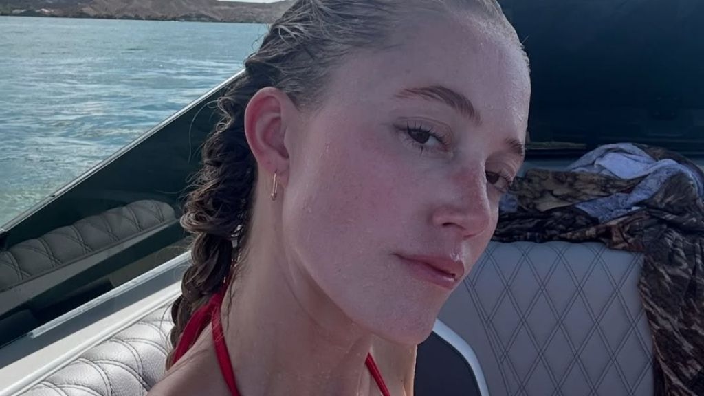 Maika Monroe’s Tiny Bra-Top Dips Dangerously Low & Is Held by Thin Straps