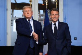 Donald Trump & Emmanuel Macron's Handshake Is Raising Eyebrows