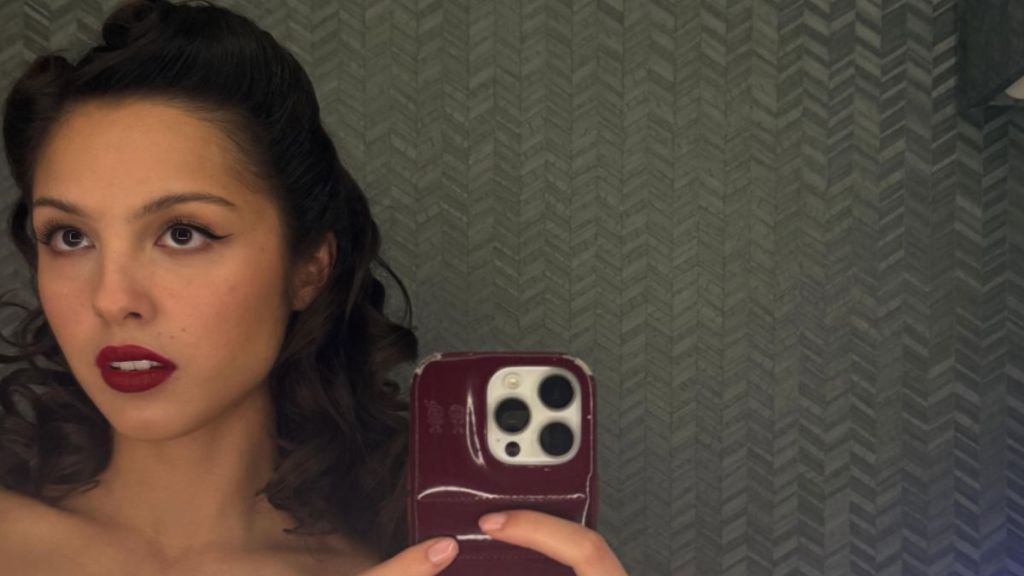 Olivia Rodrigo Flaunts a Flirty Lingerie Moment Under Unbuttoned Jacket