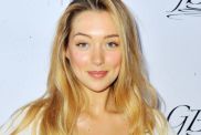 Penny Lane’s Ripped Swimsuit Barely Contains Her Voluptuous Figure