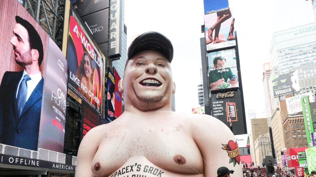 Shirtless Elon Musk Inflatable at Times Square Sparks Buzz — Report