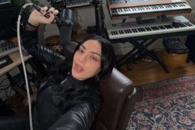 Charli XCX Goes Braless in Fully Unbuttoned Jacket Barely Put Together