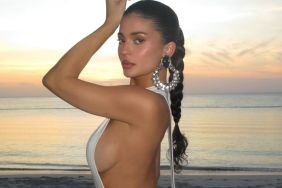 Kylie Jenner’s Wet White Side-Baring Dress Lets Her Curves Do Most of the Talking