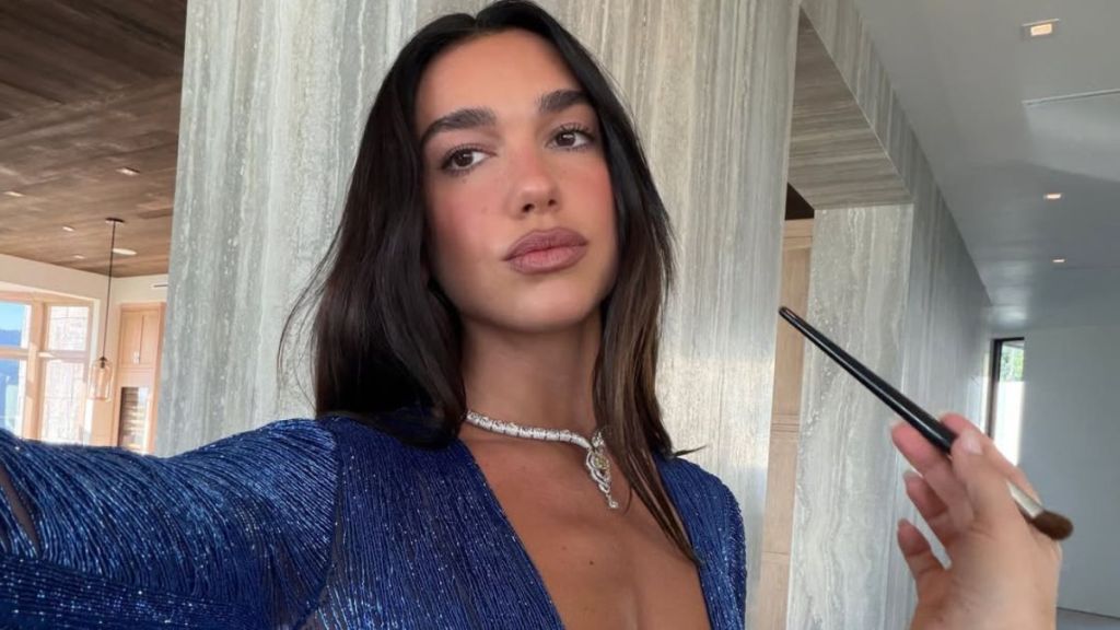 Dua Lipa's Halter Dress With a Never-Ending Cut Leaves Very Little Covered