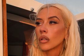 Christina Aguilera Walks In a Low-Cut Dress That Leaves Very Little Covered
