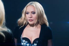 Madonna Twists & Turns on Table in Plunging Bodysuit