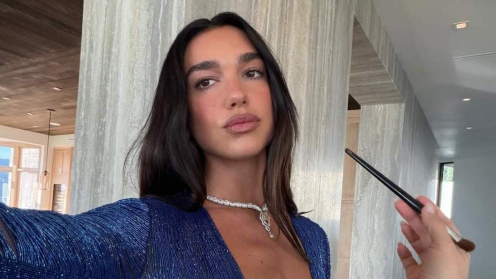 Dua Lipa Pushes the Limits in Top That Hangs by Just 2 Strings