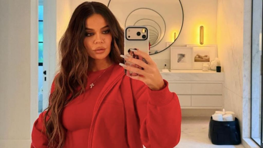 Khloe Kardashian Is Summer Ready in Dangerously Unbuttoned Top