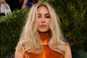 Kim Kardashian Flaunts Her Famous Curves in Nearly Unzipped Bodysuit