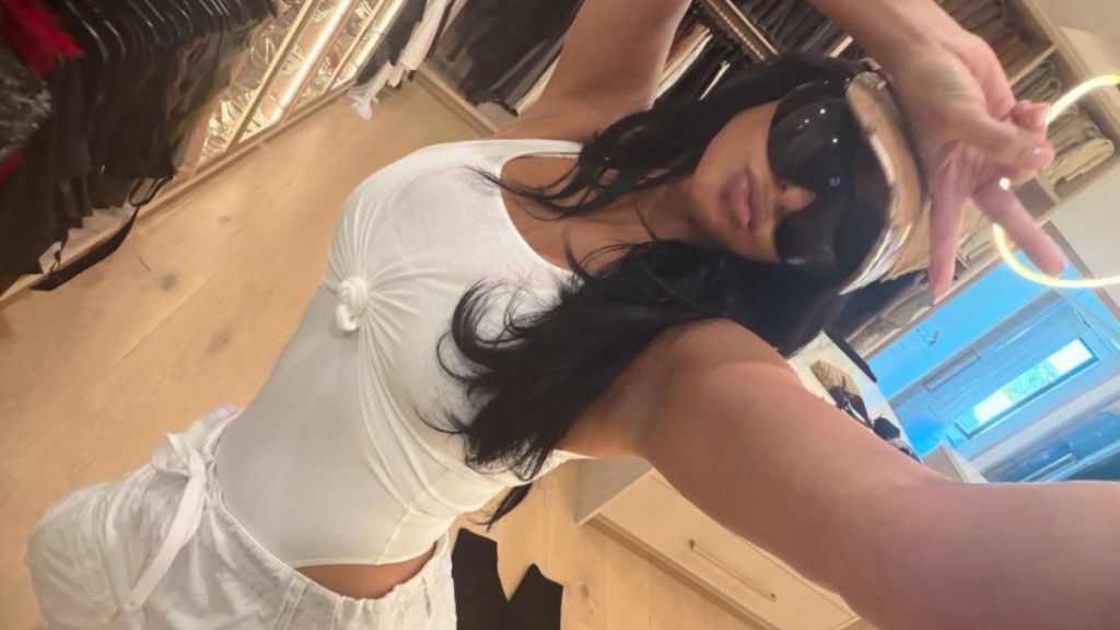 Kim Kardashian Nearly Spills Out of Low-Cut String Bikini Tops