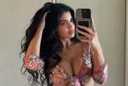 Kylie Jenner Strips Down to Nude Bra While Teasing New Fragrances