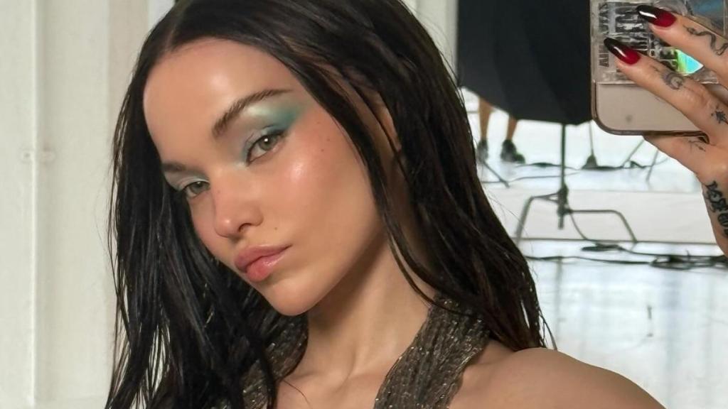 Dove Cameron Nearly Has a Wardrobe Mishap in Deeply Plunging Fit