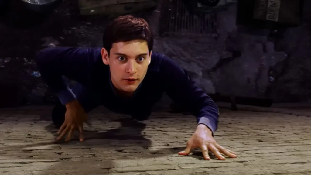 Spider-Man Star Tobey Maguire Appears To Kiss 26-Year-Old Rapper at Party