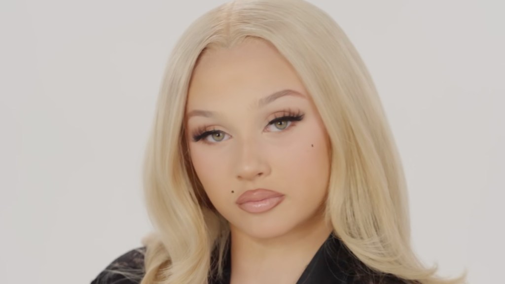 Alabama Barker Poses in Nothing But Sheer Lace That's Practically See-Through