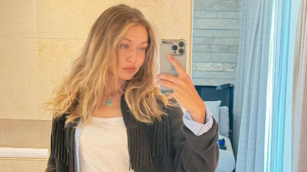 Gigi Hadid’s Flirty Bra Peeks Through Cutout in Curve-Hugging Dress for Taylor Swift Wedding