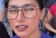 Mia Khalifa Wears a Tiny T-Shirt as a Dress That Barely Covers Her Curves