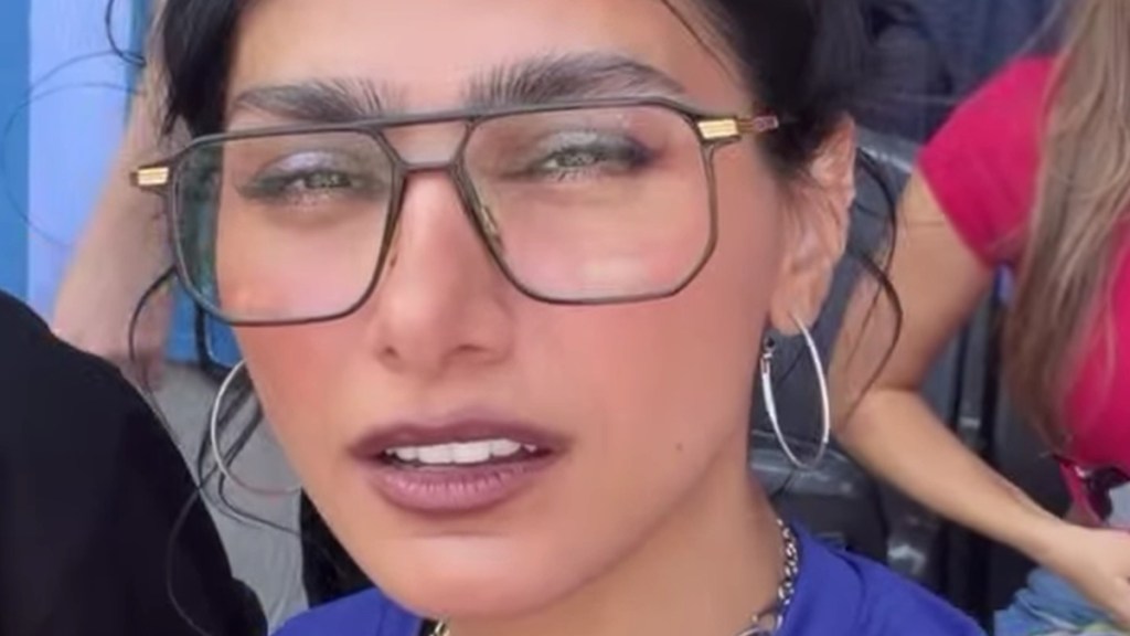 Mia Khalifa Wears a Tiny T-Shirt as a Dress That Barely Covers Her Curves