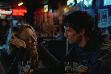 Jake Johnson & Dakota Fanning Make Bad Relationship Decisions in The Sun Never Sets Trailer