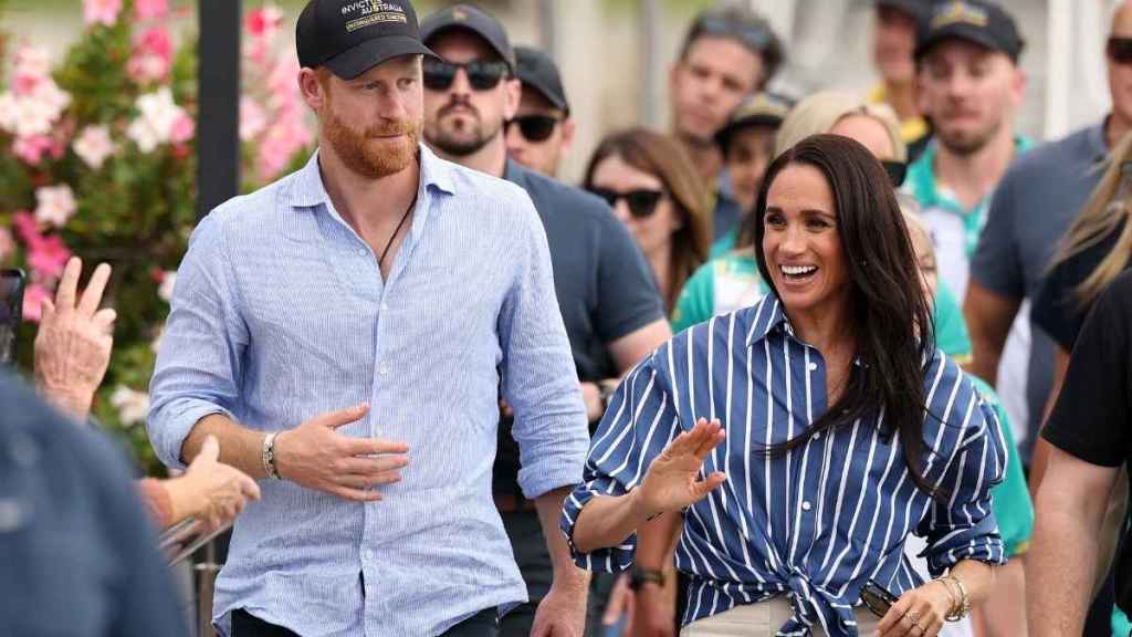 Prince Harry's Solo Visit Solved One Big Meghan Markle Problem — Source
