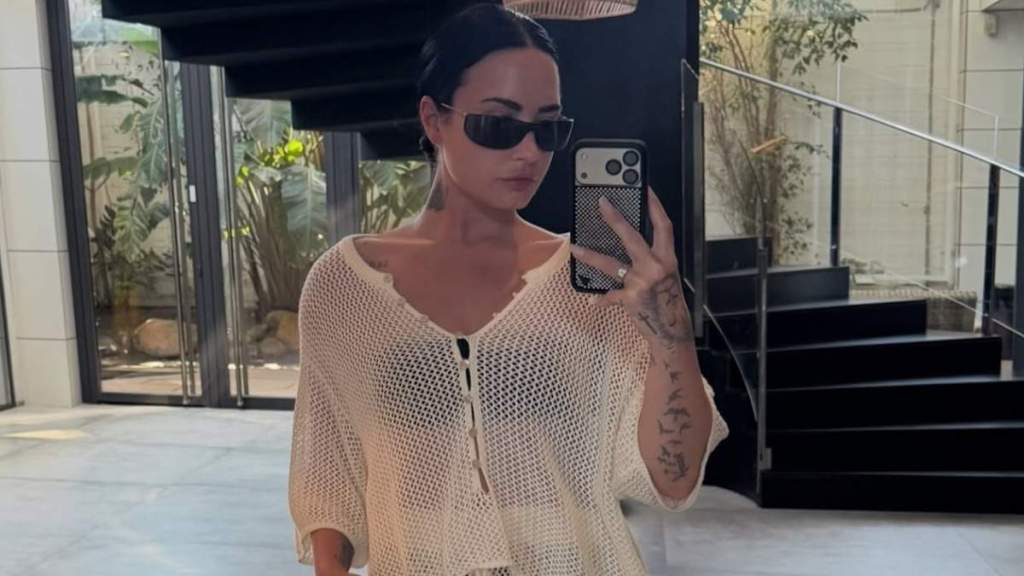 Demi Lovato's Soaking One-Piece Swimsuit Barely Covers Anything