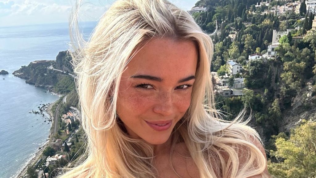 Livvy Dunne Takes Bathroom Selfie With Boyfriend in Red-Hot Mini Skirt & Crop Top