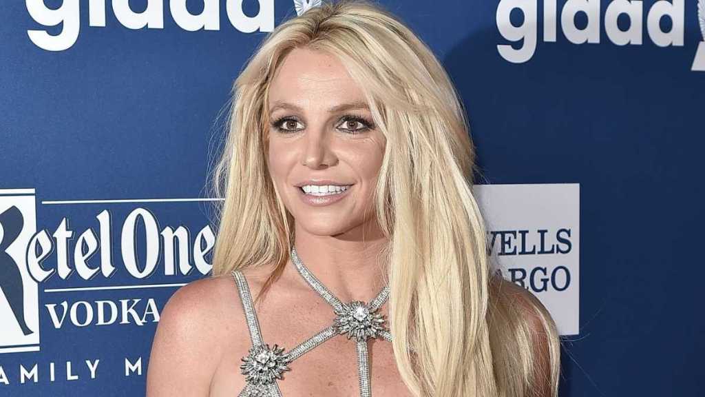 Britney Spears' Plunging Neckline Gets Wider With Every Daring Fit