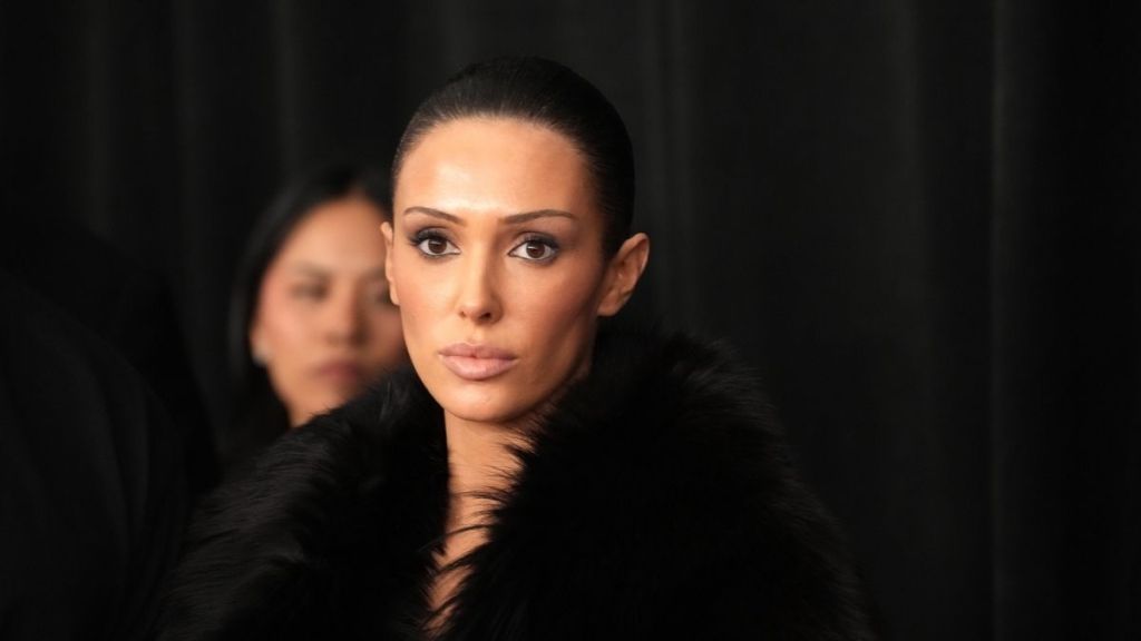 Bianca Censori’s Sheer-Illusion Catsuit Slips Riskily off the Shoulder