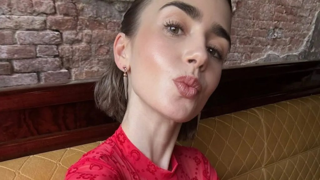 Lily Collins Seemingly Shoved by CEO in Chaotic Paris Fashion Week Video