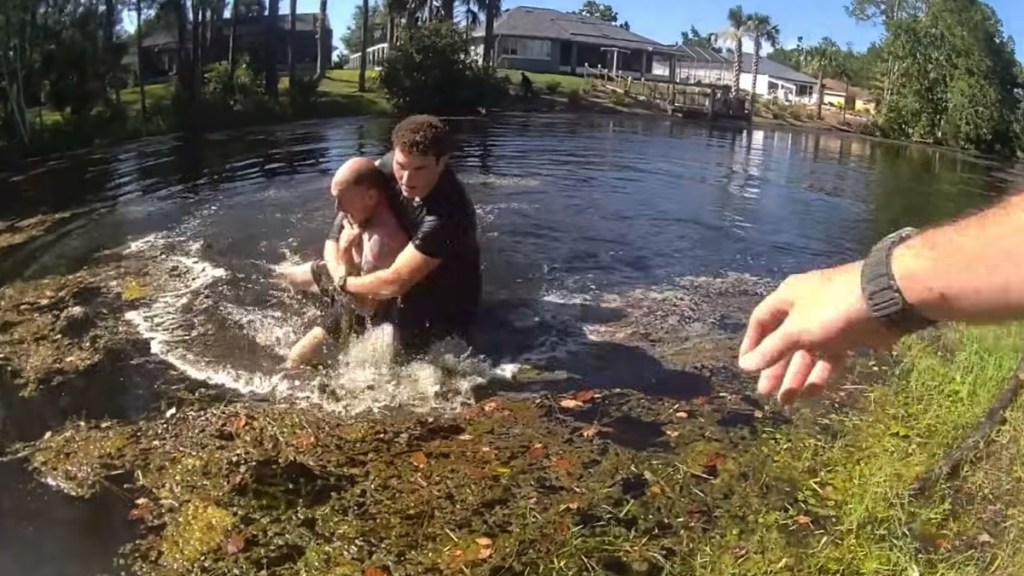 Man Attacks Cops Rescue Canal Snake Alligator Florida
