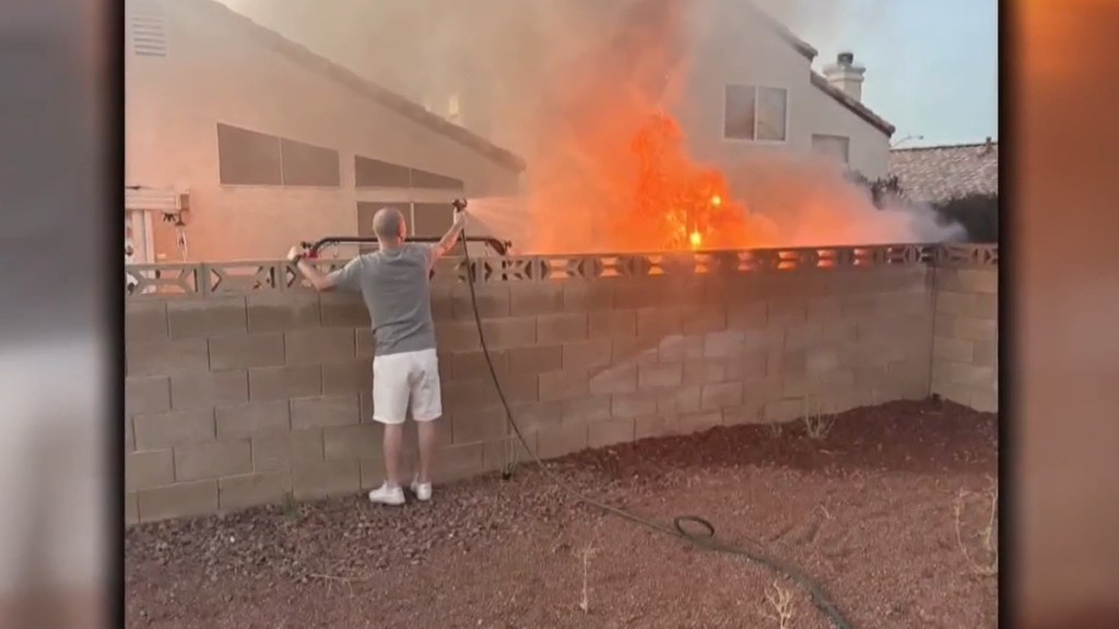 Neighbor Put Out Fire Everyone Standing Around Phones Las Vegas