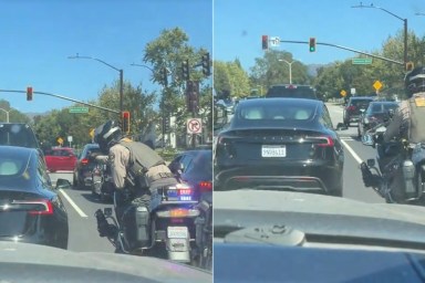 Tesla Driver Glued Phone Despite Cop Recording Bodycam Video