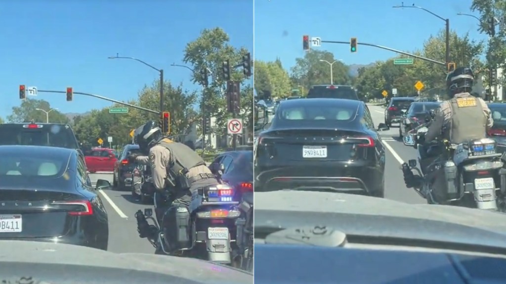 Tesla Driver Glued Phone Despite Cop Recording Bodycam Video
