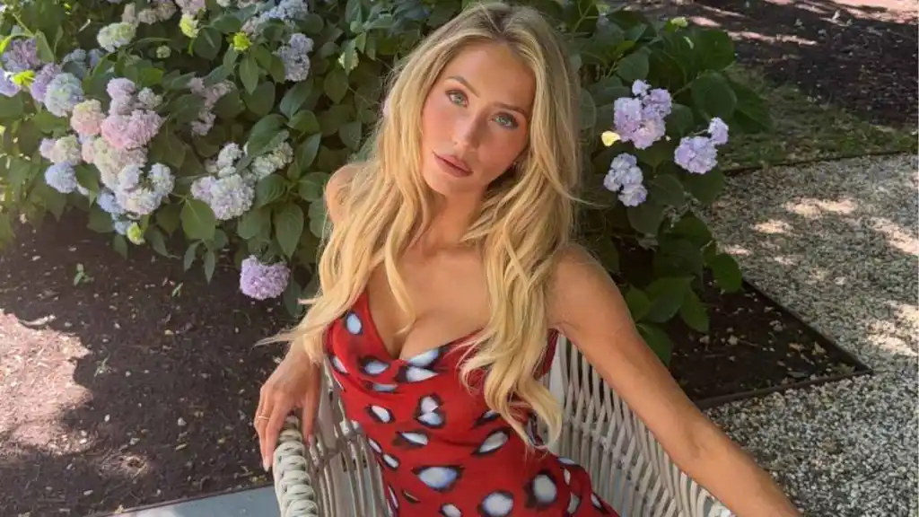 Alix Earle's Plunging Dress Dips Dangerously Low for 'Earle Meets World'