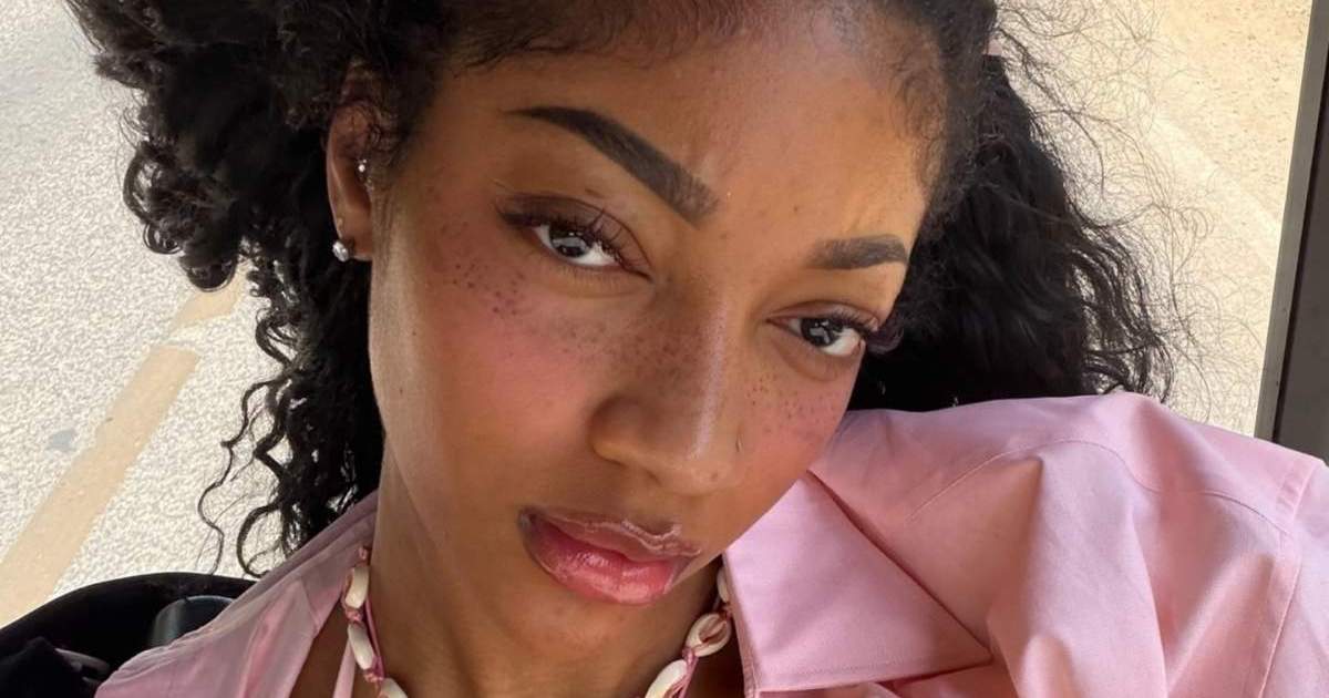 Angel Reese Flaunts Legs in a Barely-There Skirt That Clings Dangerously Tight