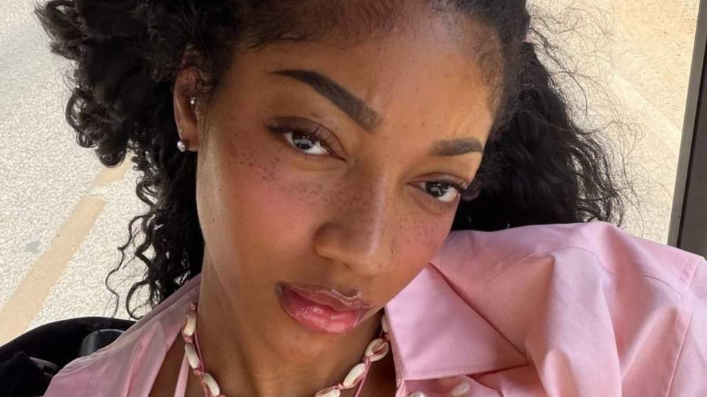Angel Reese Flaunts Legs in a Barely-There Skirt That Clings Dangerously Tight