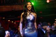 Cardi B’s Fitted Crop Top Is Just One Button Away From Giving Up