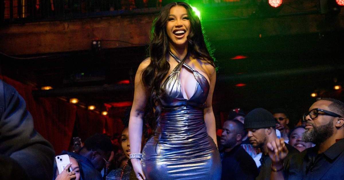Cardi B’s Fitted Crop Top Is Just One Button Away From Giving Up