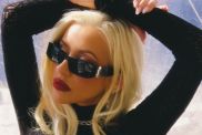 Christina Aguilera Strikes a Daring All-Fours Pose in a Dress That Dips Dangerously Low