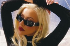 Christina Aguilera Strikes a Daring All-Fours Pose in a Dress That Dips Dangerously Low